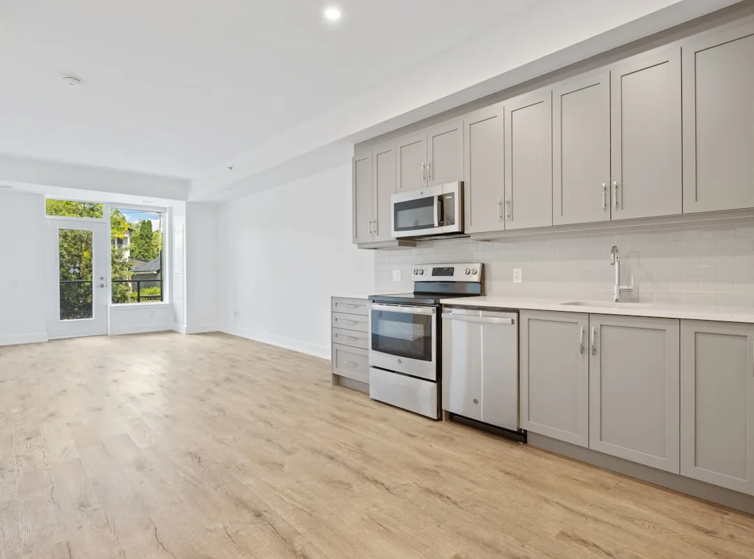 Two-bedroom basement suite in Mount Pleasant, Vancouver — open layout with in-suite laundry